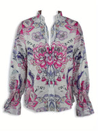 A loose, flower-patterned, long-sleeved, ruffled, elegant printed shirt