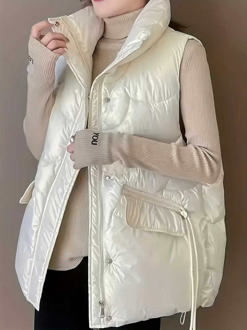 Loose pockets, drawstring stand-up collar, zippered cotton vest